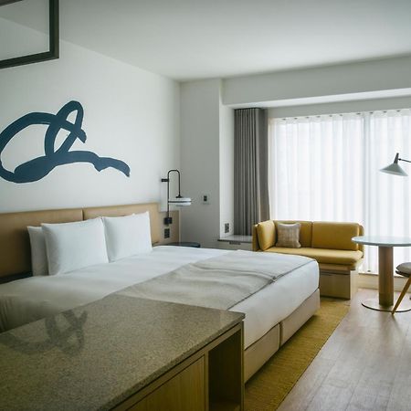Hotel Zentis Ōsaka Extérieur photo A room at the hotel
