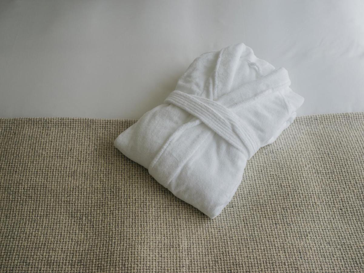 Hotel Zentis Ōsaka Extérieur photo A folded bathrobe